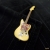 Miniature olympic white guitar lapel pin - Jaguar #0001