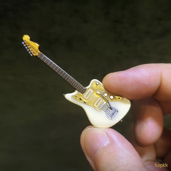 Miniature olympic white guitar lapel pin - Jazzmaster #0002 1