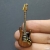 Miniature wood color guitar lapel pin - Strat #0007