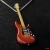 Miniature red orange color guitar pendant - Strat #0008